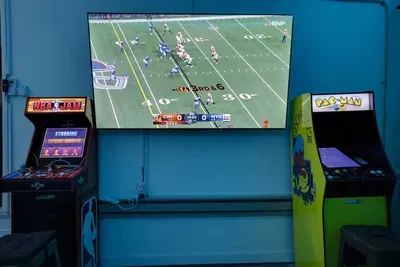 Level up your stay in our epic game room—featuring nostalgic arcade favorites like NBA Jam and Pac-Man, plus a 75" smart TV perfect for streaming the big game. A fun-filled space for guests of all ages!