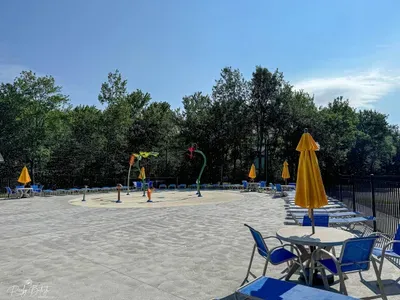 The littles will love this colorful, seasonal splash pad—designed for safe water play, shaded seating, and sunny fun. Optional access available with HOA wristbands for guests seeking family-friendly amenities.