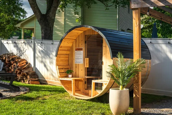 Private backyard barrel sauna for a cozy, spa-like retreat