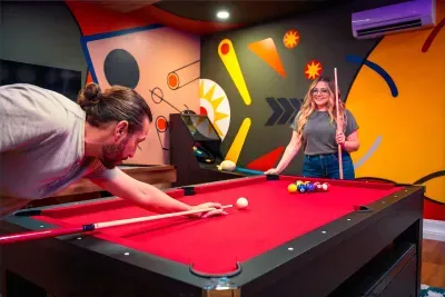 Colorful game room with pool table for fun-filled guest nights