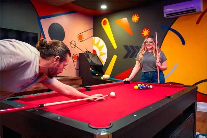 Colorful game room with pool table for fun-filled guest nights
