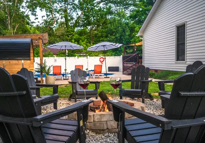 Relax by the fire pit and enjoy the private poolside retreat