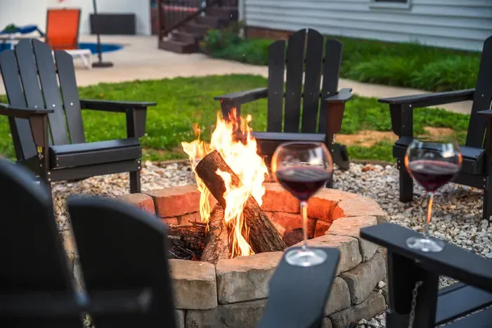 Cozy backyard fire pit with Adirondack seating for relaxing evenings