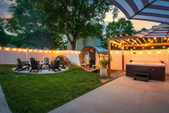 Relax under the lights with a hot tub, sauna, and cozy fire pit lounge