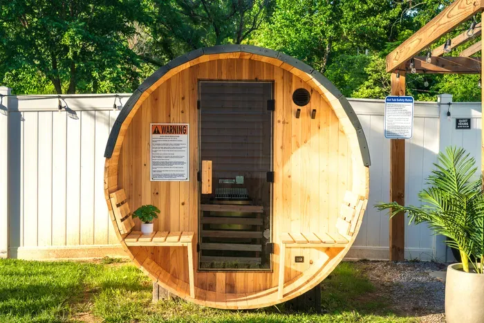 Private outdoor barrel sauna for a relaxing spa-style retreat