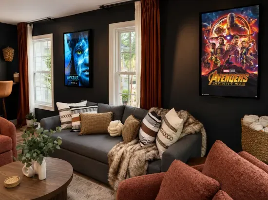 Cozy movie-themed lounge with bold decor and inviting natural light