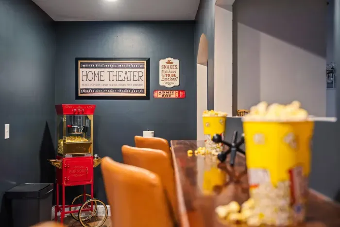 Cozy home theater snack bar with vintage popcorn machine