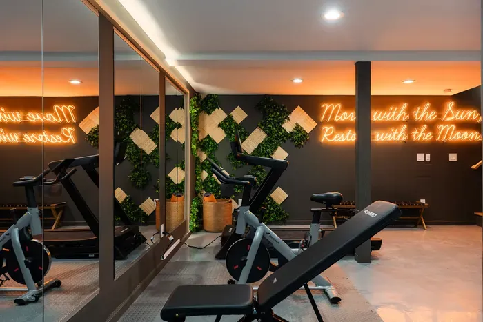Keep the workout simple without leaving the house. A quick lift, a ride, or a stretch session fits before coffee, hikes, or hot tub time.