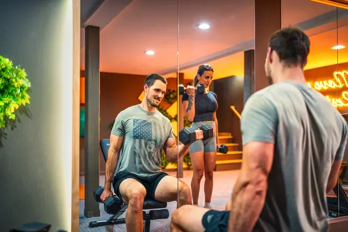 Train together, pace each other, then break for the hot tub. The gym makes room for the partner workout before the mountain day begins and the rest of the group rolls out for breakfast.