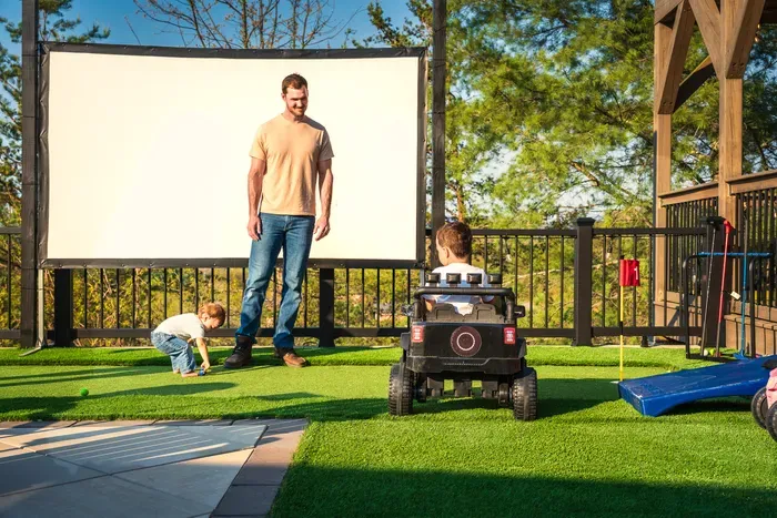 Putt a few before the projector fires up, kids running the ride-on car around the deck. The kind of slow afternoon nobody up here ever bothers checking the clock during.