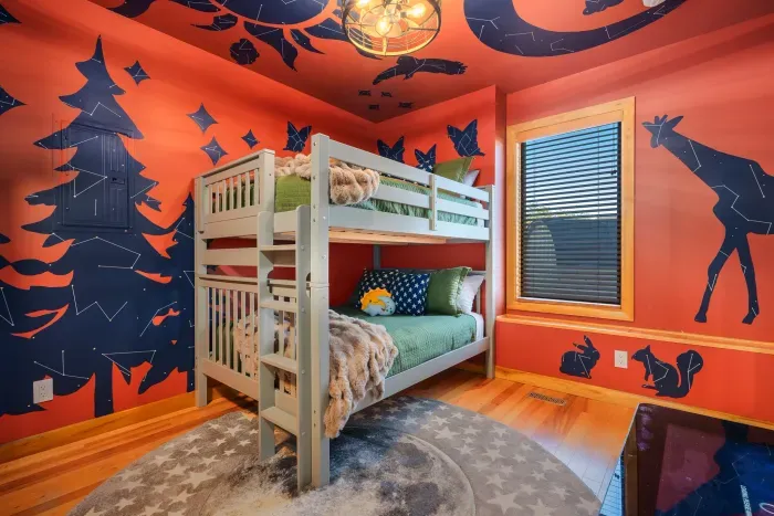 The kids call dibs the moment they walk in. The bunk bed earns top-bunk negotiations and bedtime stops being a fight when the room itself is part of the adventure.