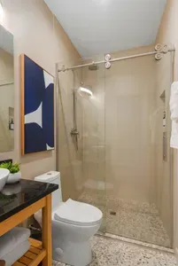 Give one part of the group its own getting-ready lane. The bath setup keeps people moving without turning mornings into a schedule.