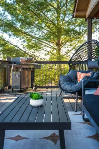 Fire up the grill on the covered deck, pull the armchair close, and let the smell of dinner drift over the mountains while everyone wanders out from inside one by one.