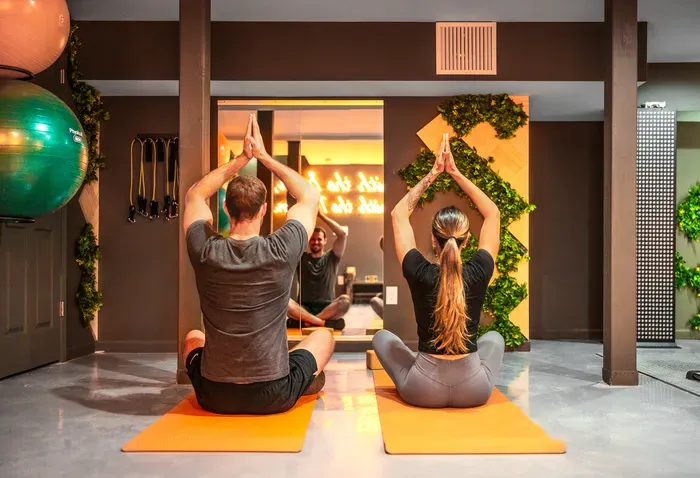 Start the day with the slow morning yoga flow, the kind that resets you before anyone else is up. The studio waits, calm and unhurried, with room for two to share the practice.