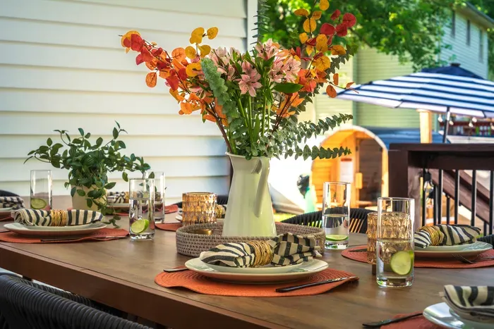 Inviting private deck with stylish outdoor dining setup
