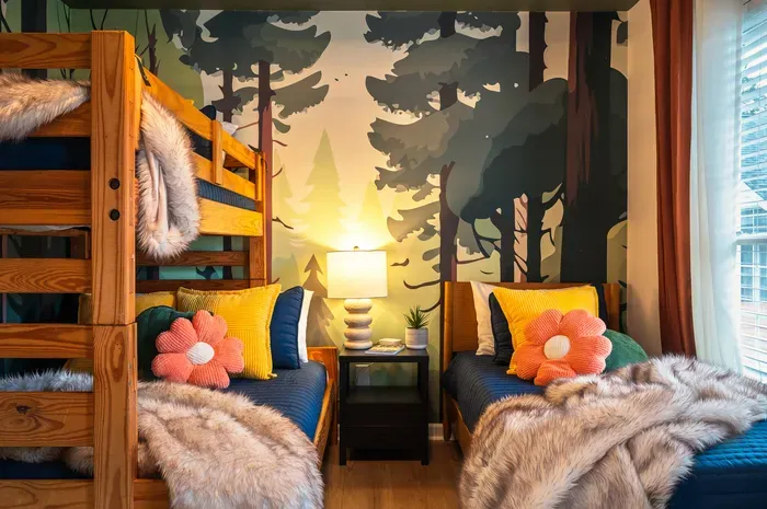 Cozy woodland-themed bedroom with playful decor and plush comfort