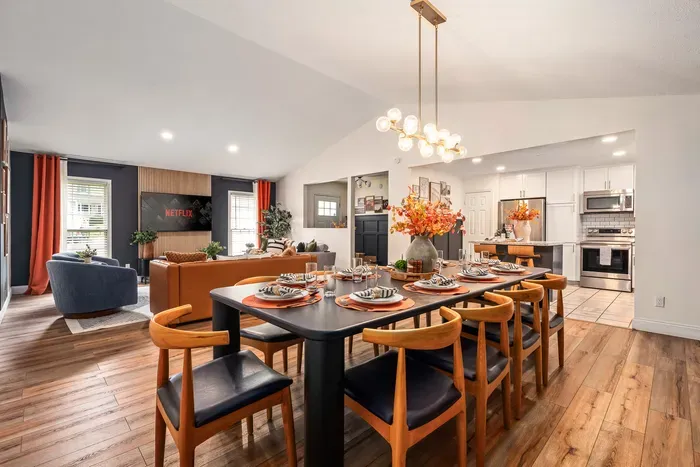 Bright open dining, lounge, and modern kitchen perfect for groups
