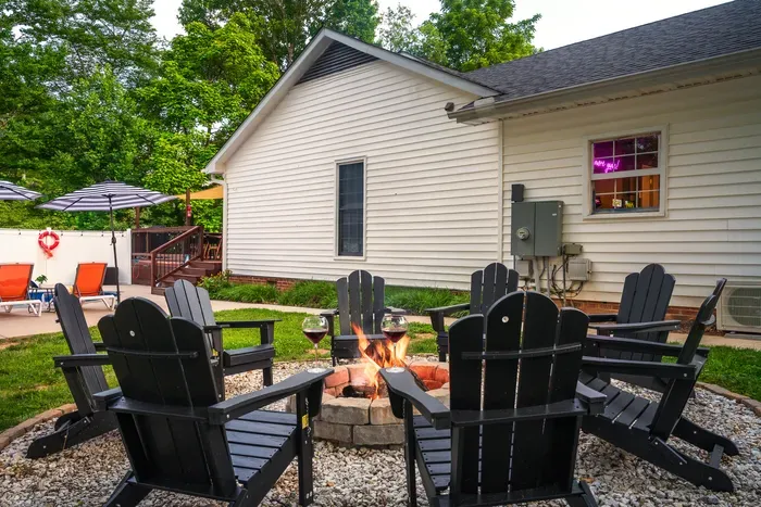 Cozy backyard fire pit with lounge seating and relaxing outdoor spaces