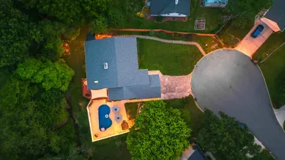Private retreat with pool deck, fenced yard, and quiet cul-de-sac setting
