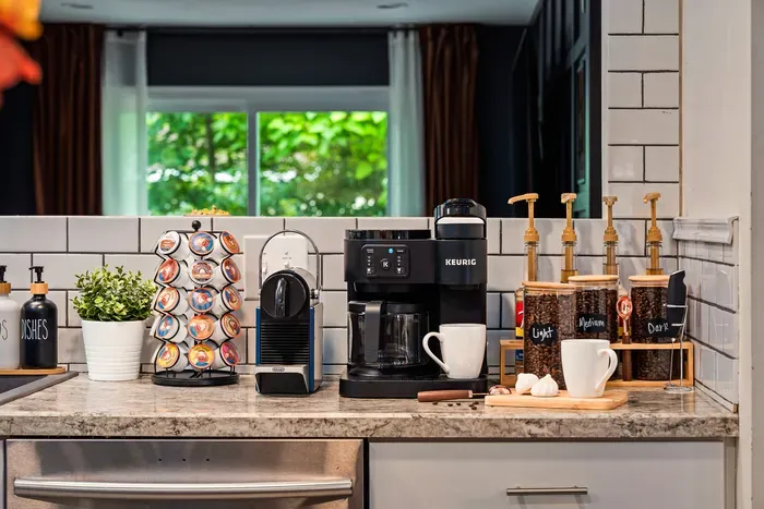 Guest-ready coffee bar with Keurig, espresso maker, and stocked essentials