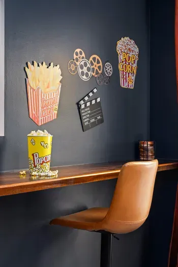 Fun movie-themed nook with stylish seating and cozy cinema-inspired decor