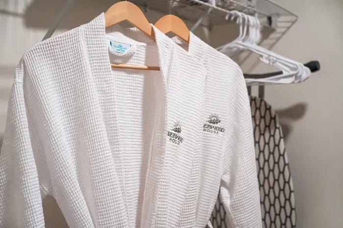 Cozy waffle robes and thoughtful closet amenities for a luxe stay