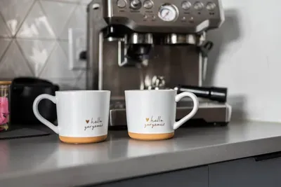 Start your mornings with ease at our fully stocked coffee + espresso bar—complete with flavored syrups, frothers, and everything you need for the perfect cup.