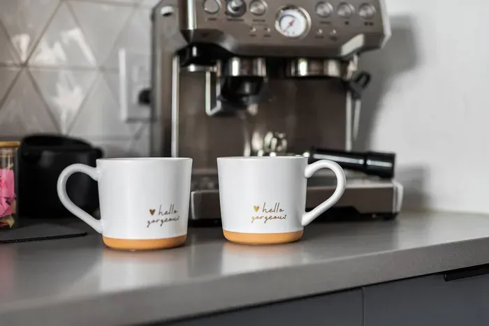 Start your mornings with ease at our fully stocked coffee + espresso bar—complete with flavored syrups, frothers, and everything you need for the perfect cup.