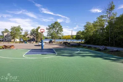 Enjoy some friendly competition or solo practice on the outdoor basketball court—just steps from the lake and close to Moonlit Peak. The perfect spot for active moments between your cozy fireside nights.