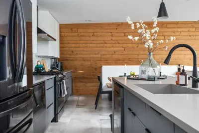 Modern kitchen designed for gatherings— appliances, generous counter space, and all essentials provided.