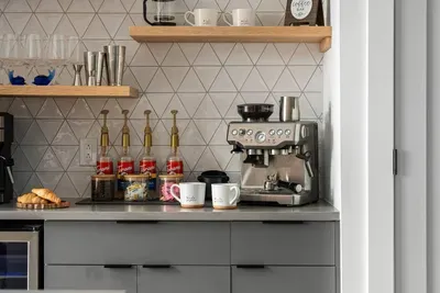 Start your mornings at Moonlit Peak with a gourmet coffee station—complete with premium espresso, flavored syrups, and all the fixings—then sip your coffee while soaking in serene lake views.