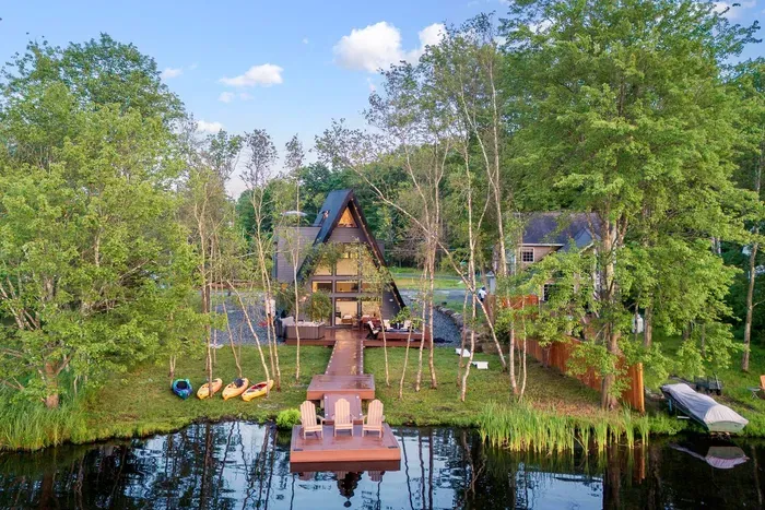Perched on a private lakeshore, Moonlit Peak blends striking architecture with serene natural beauty — your ultimate getaway destination.