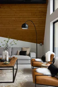 A peaceful corner designed for slow mornings and long conversations. Sink into buttery-soft seating, framed by warm wood tones and oversized windows that blur the line between indoors and out.
