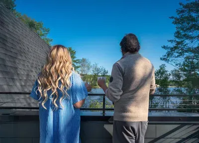 Sip coffee or wine on the balcony while taking in peaceful lake and treetop views — the perfect spot to slow down and reconnect