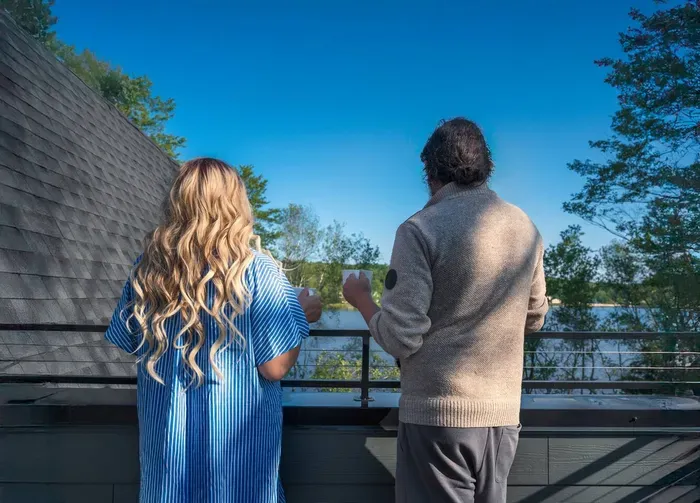 Sip coffee or wine on the balcony while taking in peaceful lake and treetop views — the perfect spot to slow down and reconnect