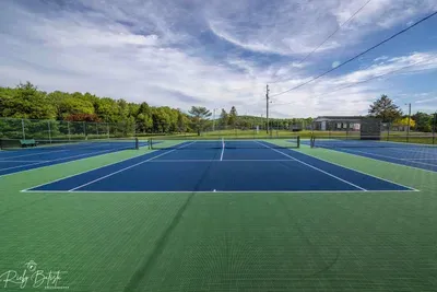 Enjoy a friendly match or perfect your swing on the beautifully maintained tennis courts just a short stroll from Moonlit Peak. Courts are lined for both tennis and pickleball—don’t forget your gear!