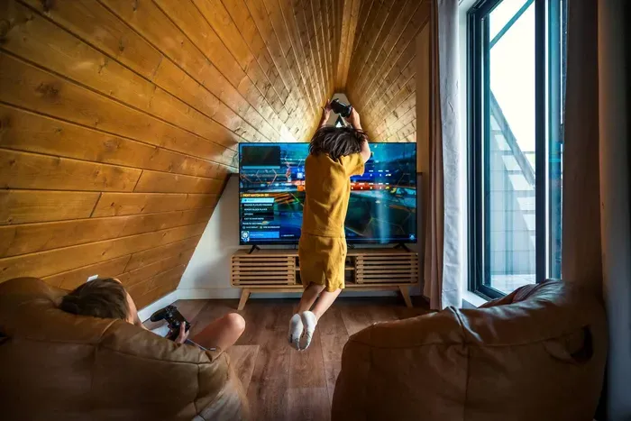 Cozy bean bag seating, large-screen TV, and a PS4 gaming console make this loft a hit with kids, teens, and the young-at-heart. The perfect spot to relax, play, or stream your favorite shows.