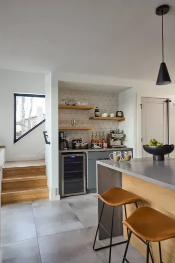 Our stylish coffee and beverage bar features a Breville espresso machine, drip coffee maker, Kcups, tea selection, and wine fridge—perfect for slow mornings or winding down after a day of adventure.