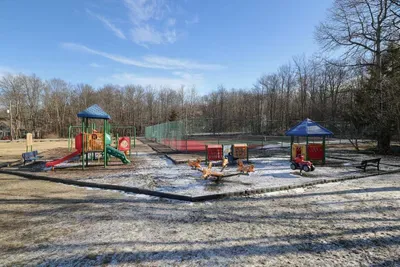 This vibrant playground and tennis area offers fun for all ages—with climbing structures, ride-on toys, and courts for a quick match or two. Located within the amenity-rich community just minutes from Moonlit Peak.