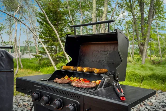 Enjoy lakeside cookouts with the propane grill, perfect for grilling steaks, veggies, and summer favorites right on the deck.