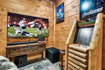 Watch a movie or the Big Game on the 75-inch smart TV! Or play the Multicade (60+ games) or the PS4.  There is also a sleeper sofa in this room.