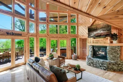Relax on comfy pillows by the warm fireplace and enjoy the big screen.