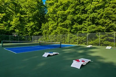 Community pickleball and basketball court surrounded by the peaceful beauty of the Smoky Mountains.