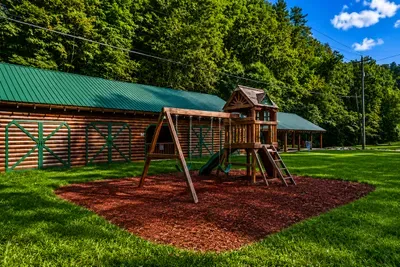 Family-friendly playground featuring swings, slides, and climbing activities for kids to enjoy.