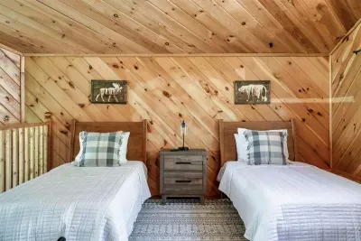 Two comfy beds, one cozy view.