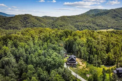 Tucked into the ridgeline with mountain views in every direction. Close enough to reach easily, far enough that all you'll hear is wind moving through the trees.