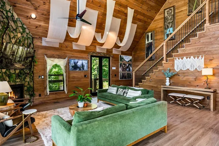 Vaulted ceilings, an open staircase, and enough seating for everyone you brought. Pine walls and mountain light make even the lazy days feel like something.
