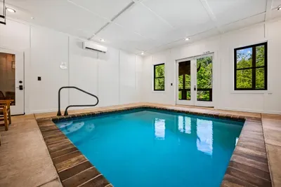 Private indoor heated pool — swim in July or January, rain or shine. The amenity that decides the booking for most families traveling with kids.