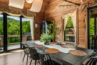 Dining for eight with the forest right outside the glass. Long breakfasts, longer dinners, and nobody in a hurry to leave the table.