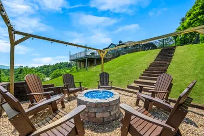 Fire pit down the stairs, so night owls can stay up loud
